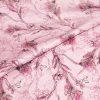 SCAMPOLO BROCCATO FIORE STILIZZATO FONDO ROSA
