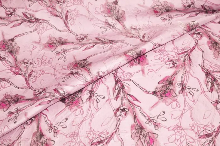 SCAMPOLO BROCCATO FIORE STILIZZATO FONDO ROSA