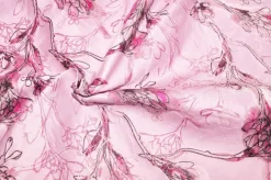 SCAMPOLO BROCCATO FIORE STILIZZATO FONDO ROSA