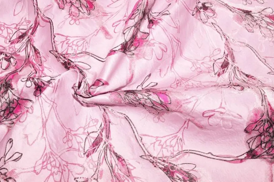 SCAMPOLO BROCCATO FIORE STILIZZATO FONDO ROSA