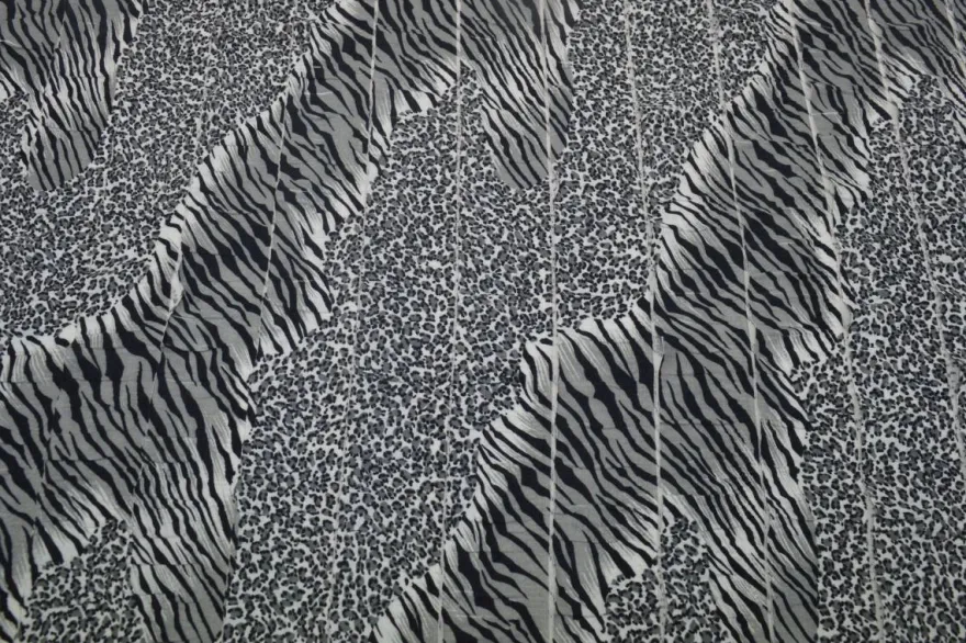 SCAMPOLO MAGLINA A BALZE JERSEY ANIMALIER ZEBRA
