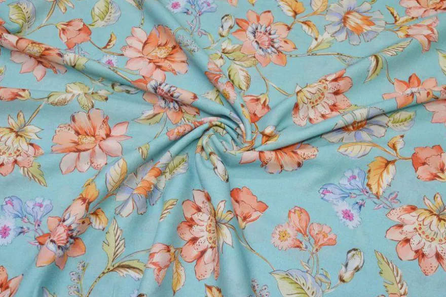 TESSUTO BATISTA PURO COTONE FLOREALE FONDO TURCHESE