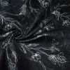 TESSUTO BROCCATO FIORE STILIZZATO FONDO NERO