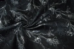 TESSUTO BROCCATO FIORE STILIZZATO FONDO NERO
