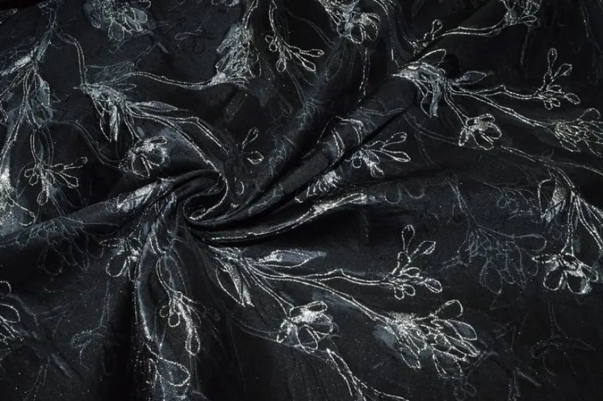 TESSUTO BROCCATO FIORE STILIZZATO FONDO NERO