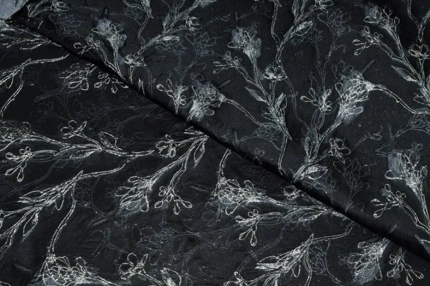 TESSUTO BROCCATO FIORE STILIZZATO FONDO NERO