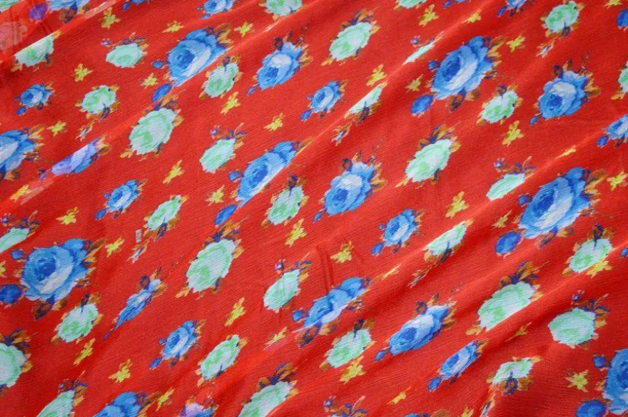 TESSUTO CHIFFON PURA SETA EFFETTO CREPON ROSSO