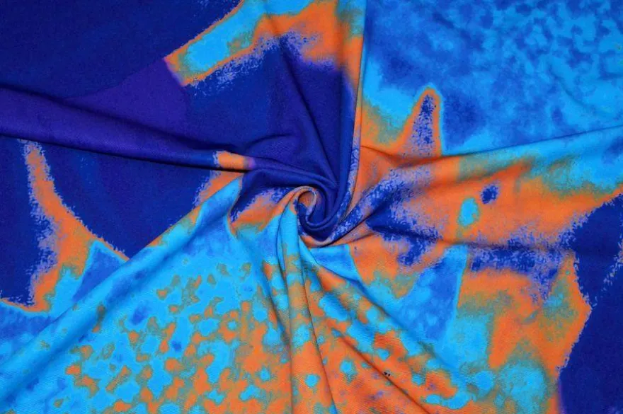 TESSUTO COMFORT FANTASIA ASTRATTA ARANCIO VIOLA