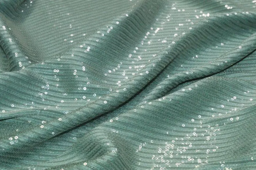 TESSUTO CON PAILLETTES CUCITE VERDE SALVIA