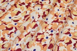 TESSUTO CREPE DE CHINE PURA SETA FIORE ASTRATTO BORDEAUX