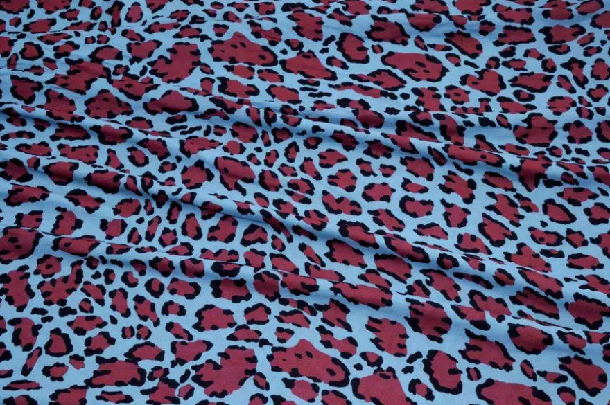 TESSUTO CREPE MACULATO AZZURRO GRANATA