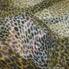 TESSUTO CREPON PURA SETA ANIMALIER