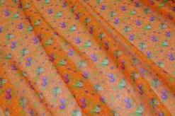 TESSUTO CREPON PURA SETA DISEGNO FRUIT ARANCIO