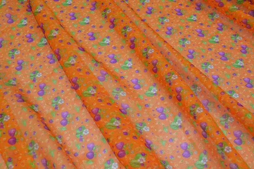 TESSUTO CREPON PURA SETA DISEGNO FRUIT ARANCIO