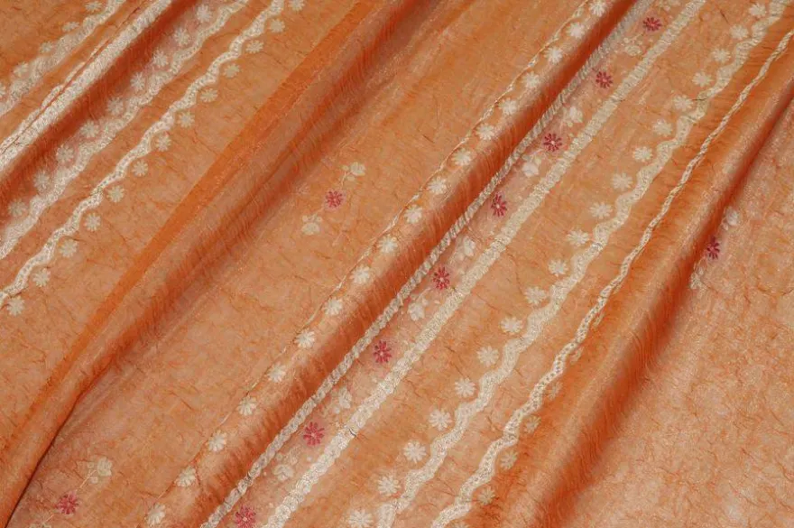 TESSUTO DOPPIA ORGANZA ARANCIO CON FIORE RICAMATO