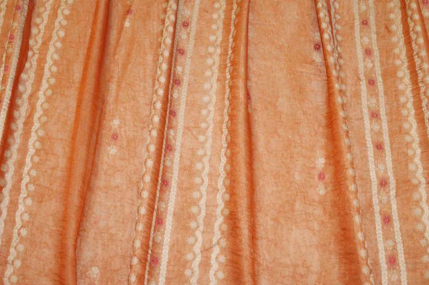 TESSUTO DOPPIA ORGANZA ARANCIO CON FIORE RICAMATO