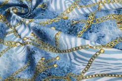 TESSUTO GABARDINE ELASTICIZZATO FANTASIA ANIMALIER AVIO