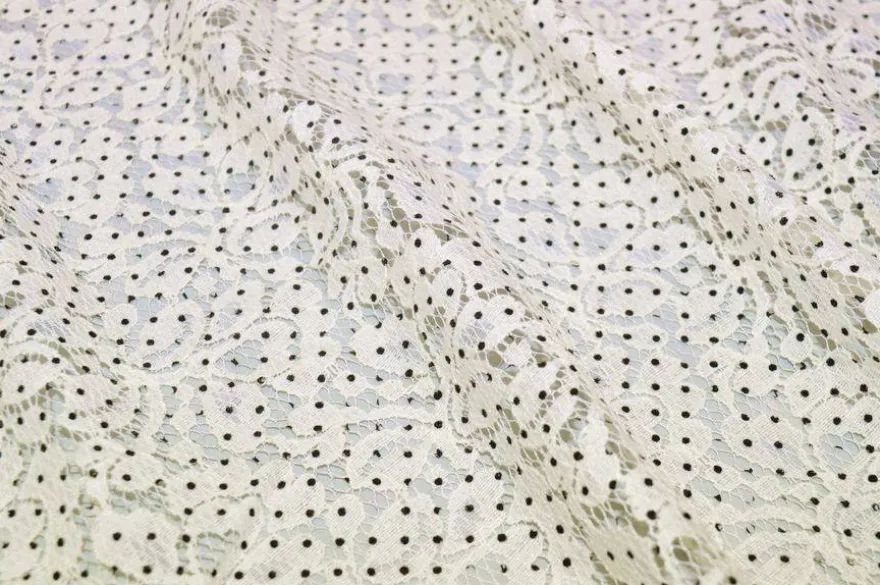 TESSUTO JERSEY DI PIZZO PANNA CON POIS NERI