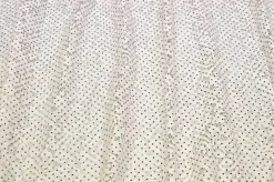 TESSUTO JERSEY DI PIZZO PANNA CON POIS NERI