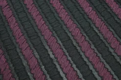 TESSUTO JERSEY NERO A RIGHE COLOR PRUGNA