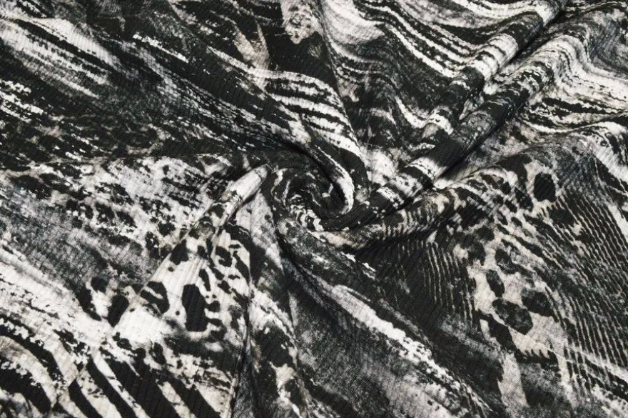 TESSUTO MAGLIA A COSTE FANTASIA SFUMATA ANIMALIER NERA