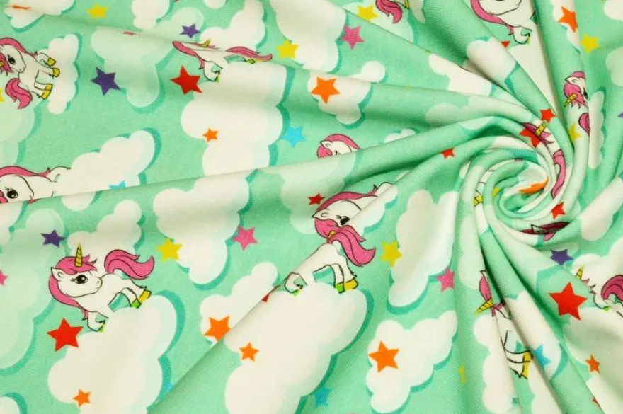 TESSUTO MAGLINA COTONE FANTASIA UNICORNO TURCHESE