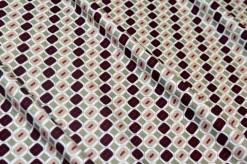 TESSUTO MAGLINA IN VISCOSA FANTASIA GEOMETRICA BORDEAUX