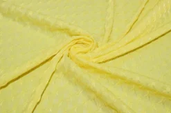 TESSUTO MAGLINA OPERATA ROMBO IN RILIEVO GIALLO
