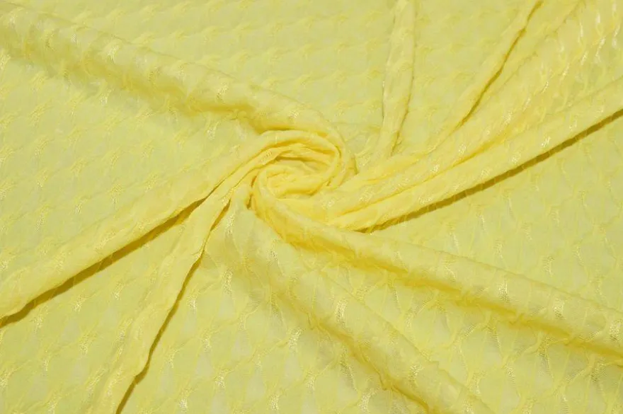 TESSUTO MAGLINA OPERATA ROMBO IN RILIEVO GIALLO