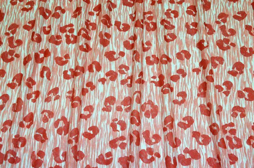 TESSUTO MAGLINA PURO LINO FANTASIA ANIMALIER ROSSO