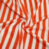 TESSUTO MAGLINA RIGATO CON PAILLETTES APPLICATE ARANCIO