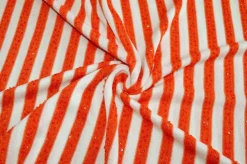 TESSUTO MAGLINA RIGATO CON PAILLETTES APPLICATE ARANCIO