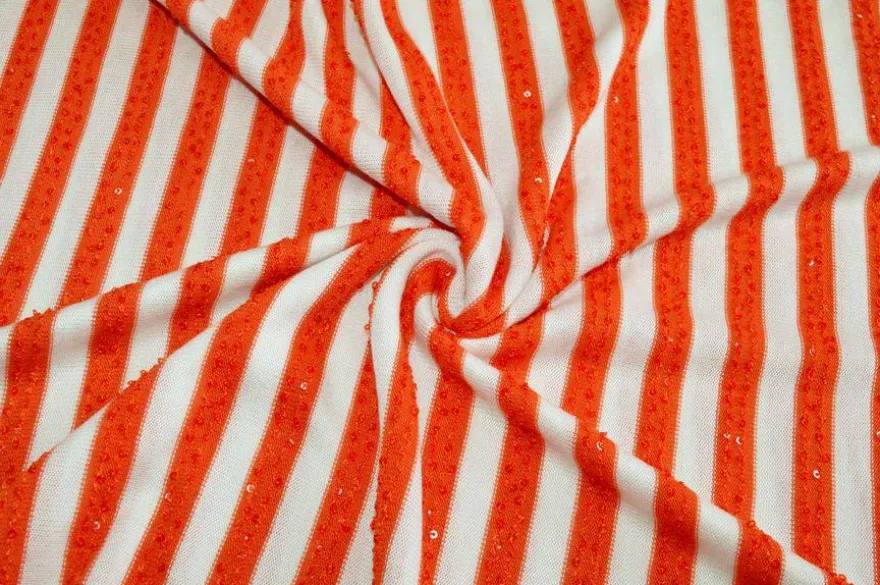 TESSUTO MAGLINA RIGATO CON PAILLETTES APPLICATE ARANCIO