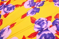 TESSUTO MAGLINA VISCOSA FANTASIA FLOREALE VIOLA FONDO GIALLO