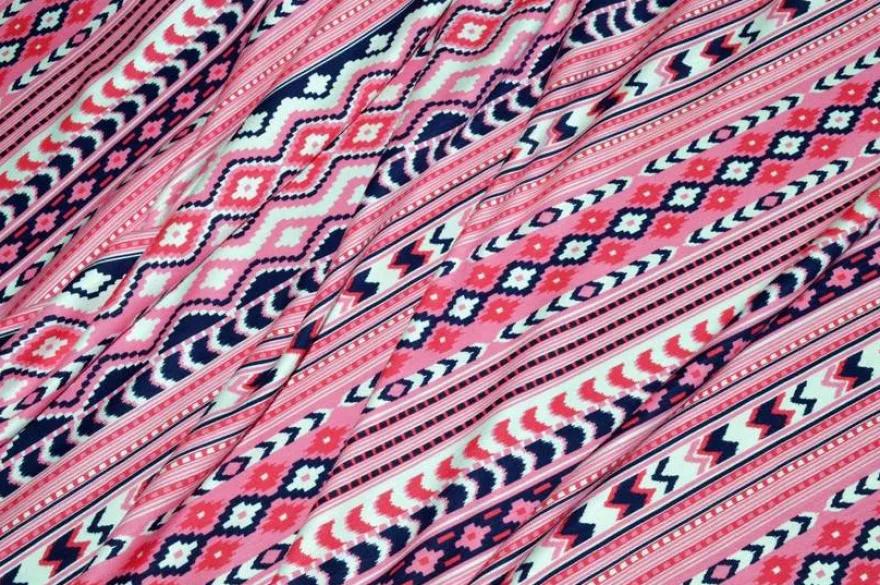 TESSUTO MAGLINA VISCOSA FANTASIA GEOMETRICA ROSA