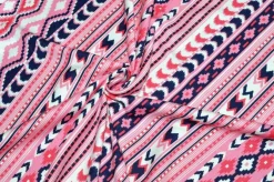 TESSUTO MAGLINA VISCOSA FANTASIA GEOMETRICA ROSA