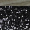 TESSUTO PAILLETTES CUCITE NERO FONDO TULLE