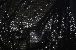 TESSUTO PAILLETTES CUCITE NERO FONDO TULLE