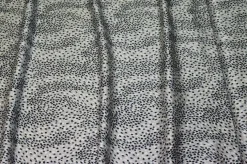TESSUTO RASATELLO PURA VISCOSA MACULATO BIANCO E NERO