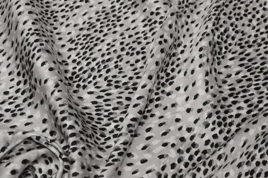 TESSUTO RASATELLO PURA VISCOSA MACULATO BIANCO E NERO