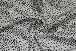 TESSUTO RASATELLO PURA VISCOSA MACULATO BIANCO E NERO