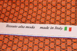 TESSUTO RASATELLO STREATCH FANTASIA ALTA MODA ARANCIO