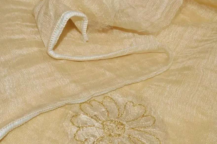 TESSUTO TENDA MISTO SETA CON RICAMO FIORE ORO