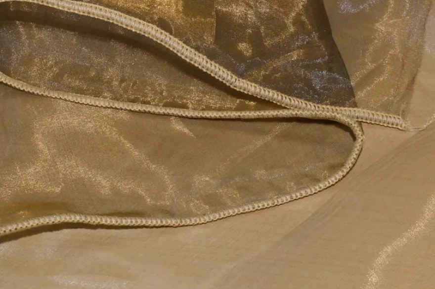 TESSUTO TENDA ORGANZA CANGIANTE ORO BLU CON RICAMO CENTRALE