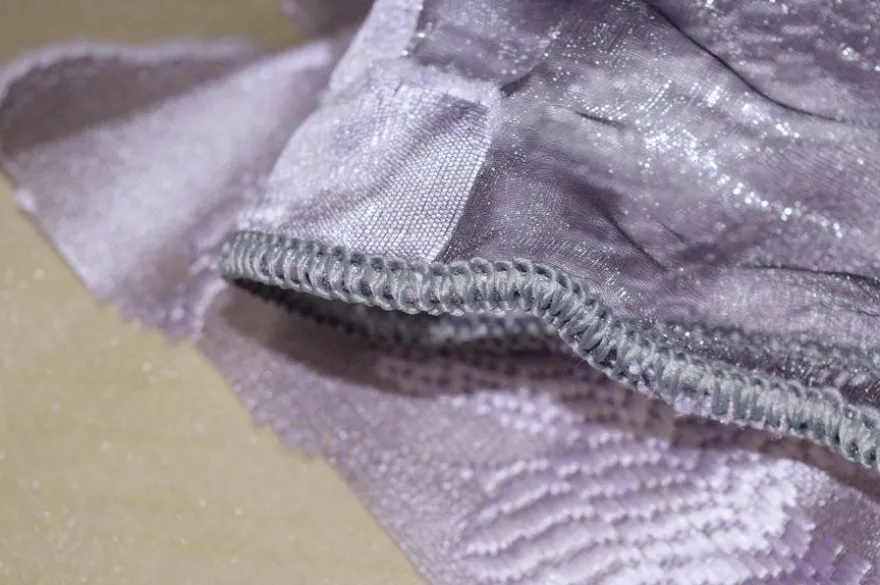 TESSUTO TENDA ORGANZA CON MAXI FIORE VIOLA