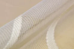 TESSUTO TENDA ORGANZA FANTASIA CERCHI ASTRATTI PANNA