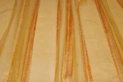TESSUTO TENDA ORGANZA GIALLO/ARANCIO CON FASCE EFFETTO CINIGLIA