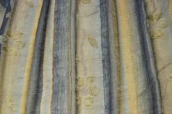 TESSUTO TENDA ORGANZA ORO CANGIANTE BLU CON FIORE