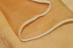 TESSUTO TENDA ORGANZA ORO CON RICAMO IN RILIEVO