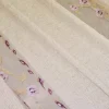 TESSUTO TENDA STROPICCIATA BEIGE CON FIORI LILLA RICAMATI
